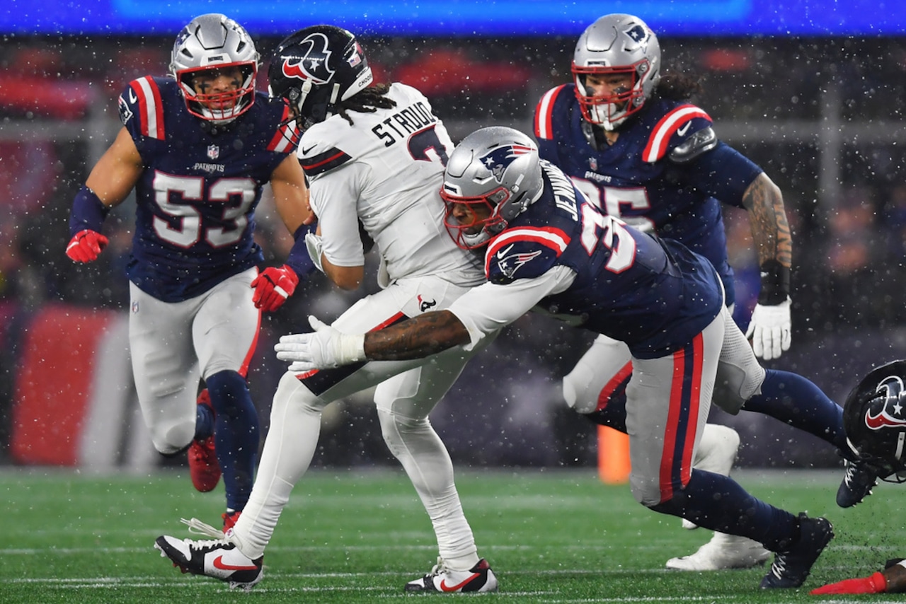 New England Patriots linebacker Anfernee Jennings tackles Houston Texans quarterback C.J. Stroud during an NFL playoff game on Sunday, Jan. 18, 2026, at Gillette Stadium in Foxborough, Mass.