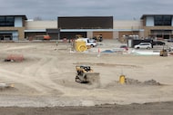 These are photos of retail business construction, including a new Home Depot and  HEB food...