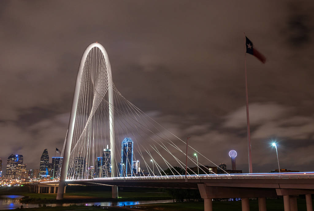 Image shows a bridge in Dallas during a stormy night