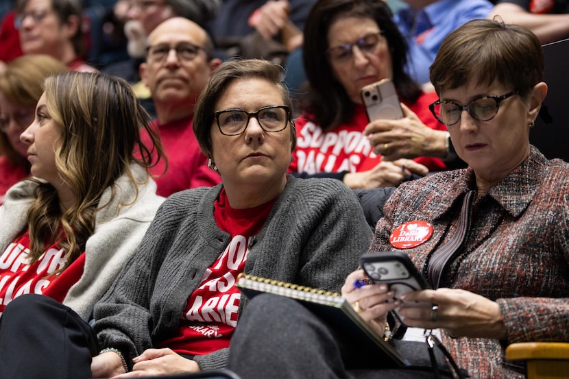 Denise McGovern (center), executive director of the Friends of the Dallas Public Library,...