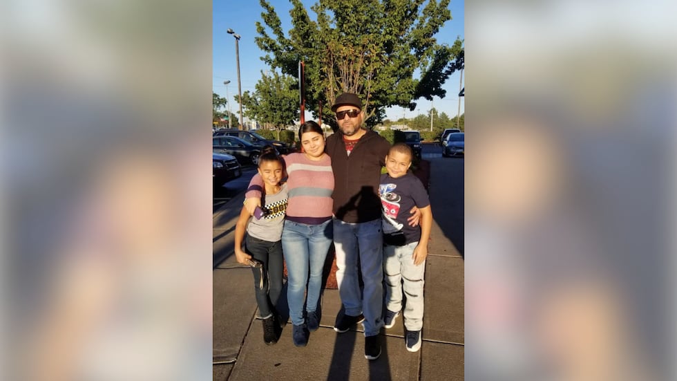 This undated photo provided by Jeanette Pagan-Lopez shows Geraldo Lunas Campos with his three...