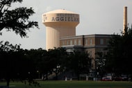 Welcome to Aggieland is painted on the central water tower on the Texas A&M University...
