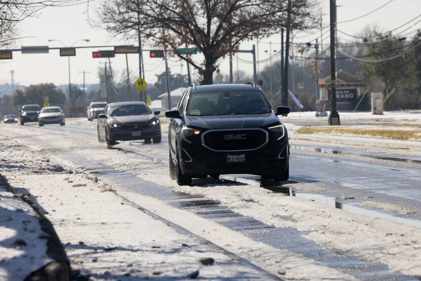Snow and ice begins to melt on Hampton Road following a winter storm on Wednesday, Jan. 28,...