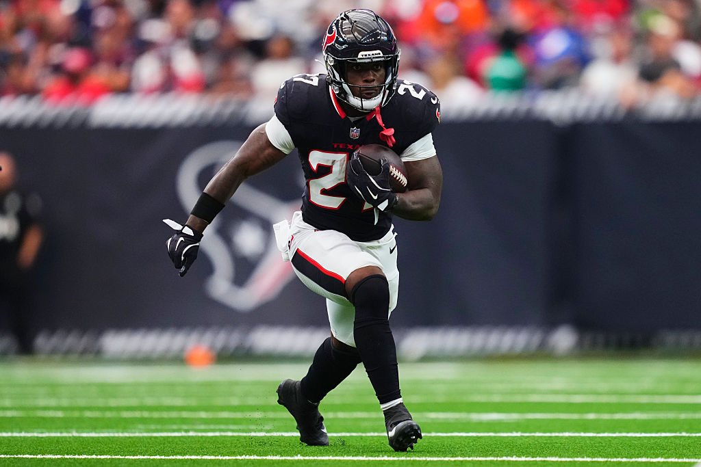 HOUSTON, TX - NOVEMBER 02: Woody Marks #27 of the Houston Texans carries the ball against the Denver Broncos during the second half of an NFL football game at NRG Stadium on November 2, 2025 in Houston, Texas. (Photo by Cooper Neill/Getty Images)