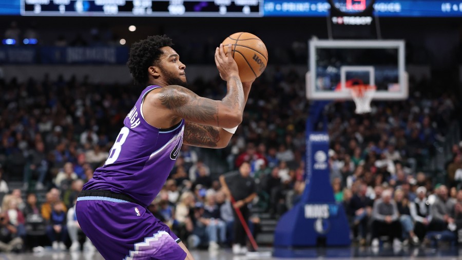 Brice Sensabaugh #28 of the Utah Jazz takes a three point shot during the second half against the D...