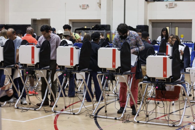 Voters cast ballots at the Metropolitan Multi-Service Center in Houston.