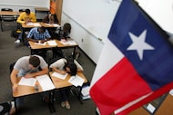 Students at Lone Star High School in Frisco wrote English essays during a practice test in...