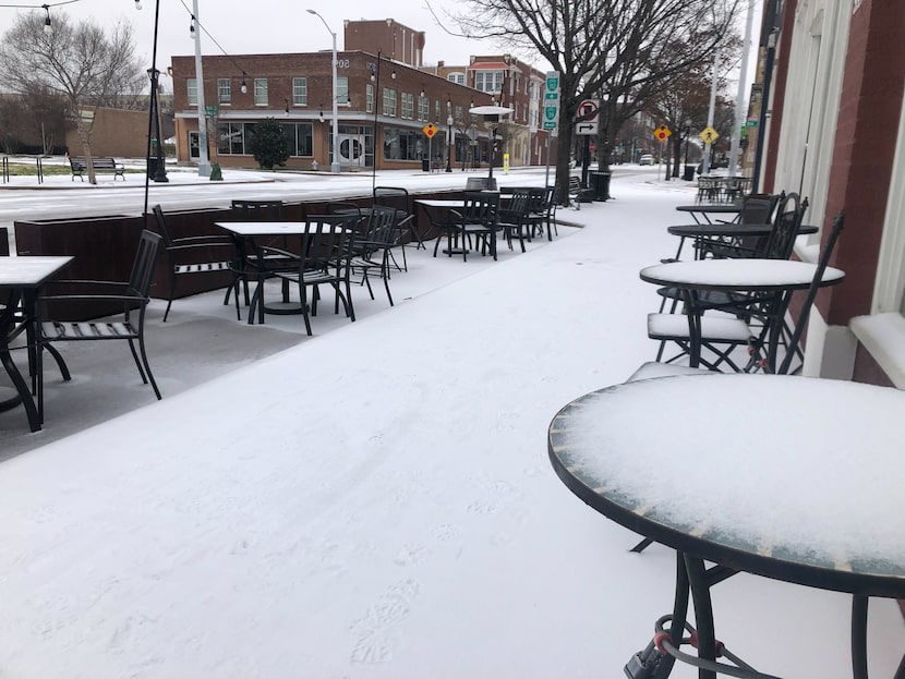 Magnolia Avenue, usually a lively strip of restaurants and shops in Fort Worth, was quiet...