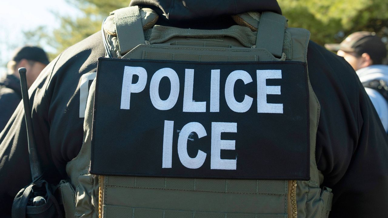 A U.S. Immigration and Customs Enforcement officer listens during a briefing, Jan. 27, 2025, in Silver Spring, Md. (AP Photo/Alex Brandon, File)