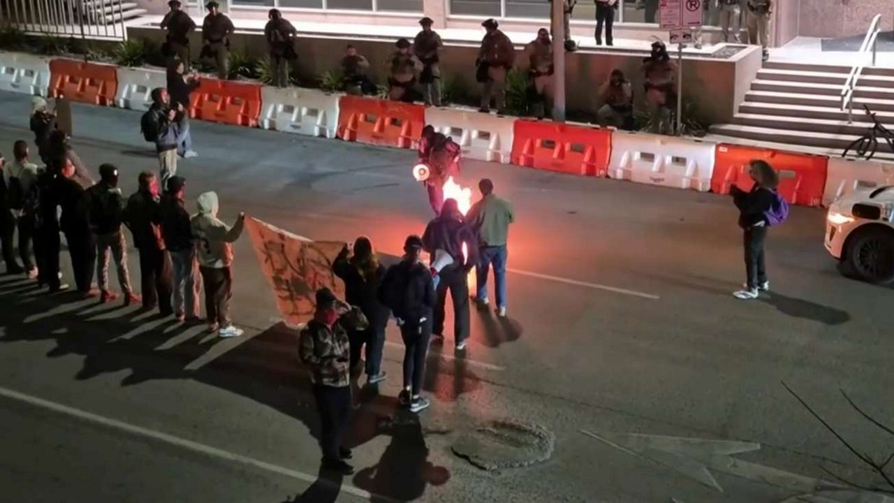 Protestors outside the J.J. Pickle Federal Building on Saturday, January 10, 2026. (Spectrum News 1)
