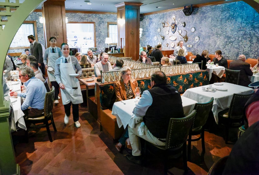Servers make their way around as they serve guests at The Chumley House, Wednesday, March 5,...