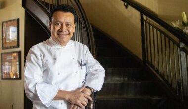 Chef Ortega stands at the entrance of his restaurant Hugo’s, which opened in 2002.