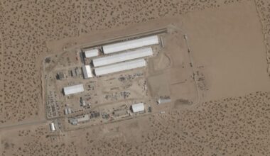 This Aug. 7, 2025, satellite image shows construction of large white tents for a new immigrant detention center at Fort Bliss, a U.S. Army base outside El Paso, Texas. (Planet Labs via AP)