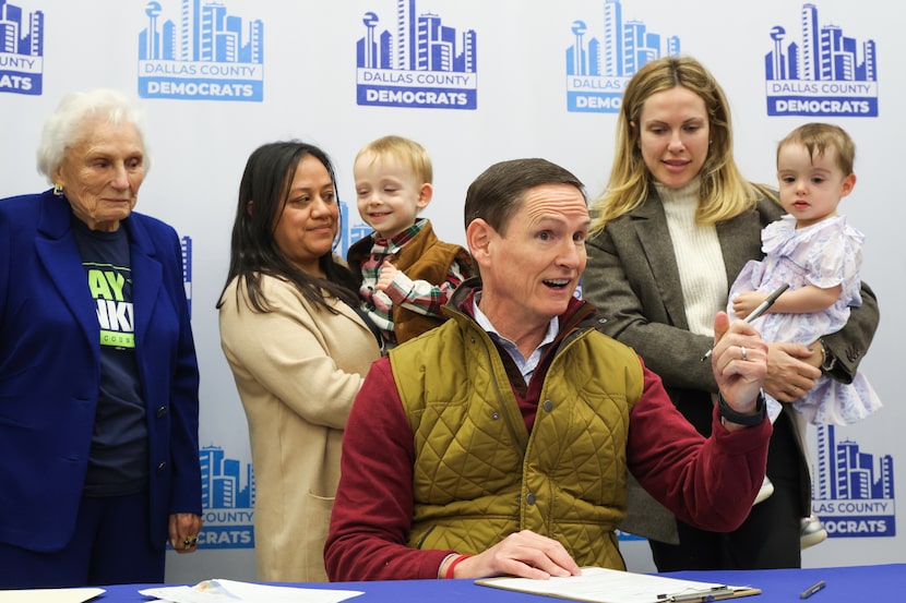 Clay Lewis Jenkins, Dallas County Judge, (center) files for his re-election at the Dallas...