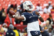 Dallas Cowboys quarterback Joe Milton III (10) throws the ball before an NFL football game...