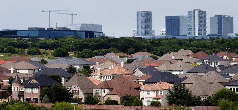 Large Plano, Texas homes fill a neighborhood near Toyota Motor North America, Inc. (left)...