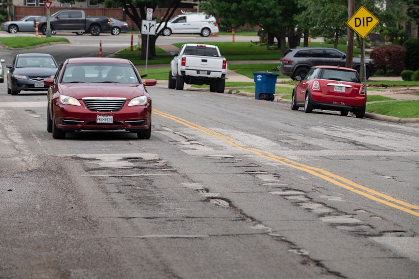 Potholes photographed in 2021 on Richmond Avenue in East Dallas.