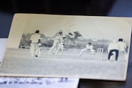 A photo of cricket enthusiast Arun Vittala playing during his college days in India is shown...
