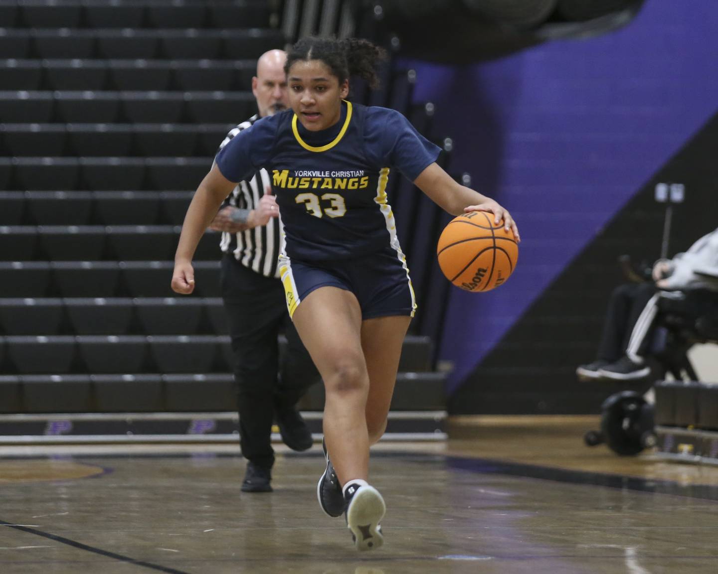 Yorkville Christian's Kiana Ogulei (33) races down the court with the ball during their basketball game between Yorkville Christian at Plano Wednesday, Jan 07, 2026 in Plano.