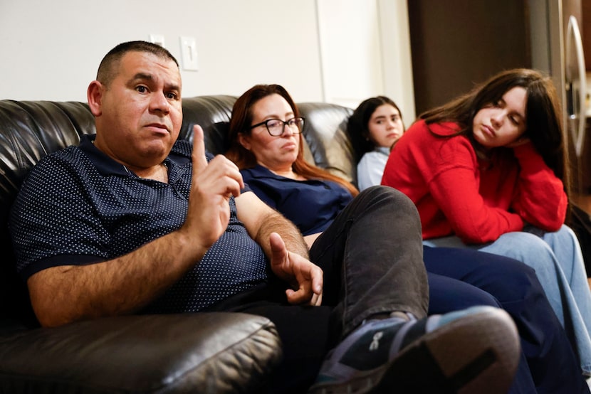 From left, Néstor Cuevas, originally of Venezuela, with his wife Yexi Carolina Mileno,...