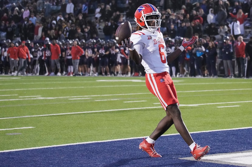 Duncanville wide receiver Trenton Yancey (6) celebrates after scoring on a 27 yard touchdown...
