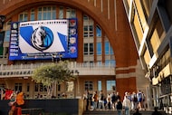Dallas Mavericks fans arrive to the American Airlines Center via Victory Plaza in Dallas,...