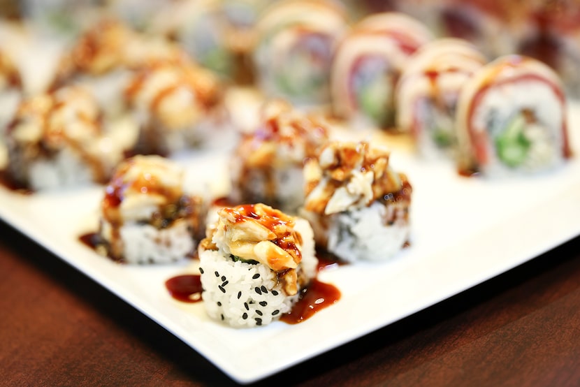 Sushi rolls at J. Alexander's are assembled by a chef, then finished by a "sushi robot"...