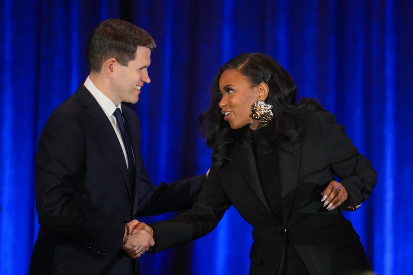 Texas state Rep. James Talarico, D-Austin, left, shakes hands with Rep. Jasmine Crockett,...