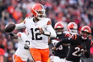 Cleveland Browns quarterback Shedeur Sanders (12) looks to throw during an NFL football game...