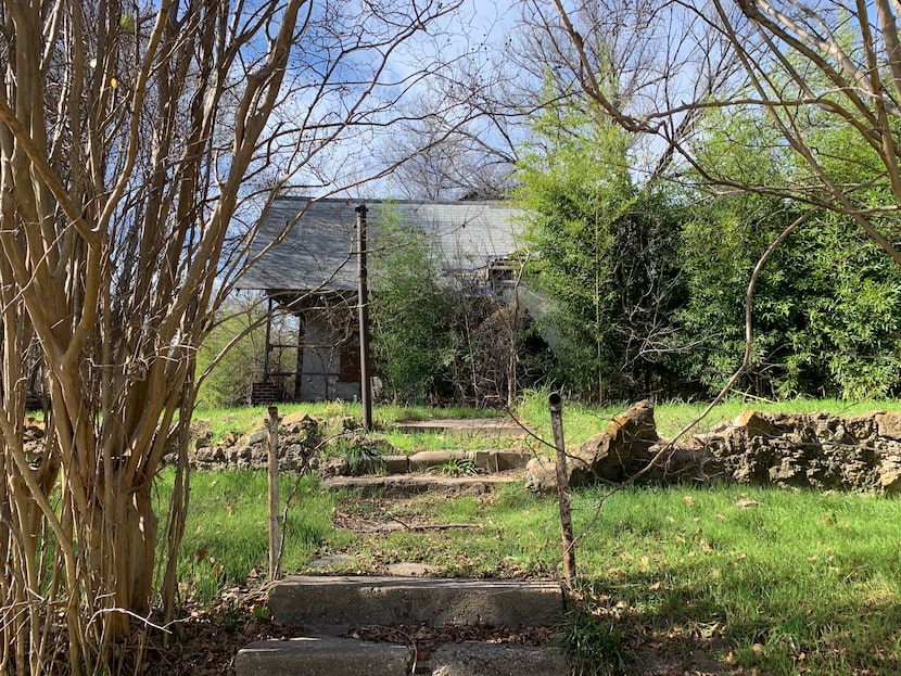 The abandoned 95-year-old two-story residence at 223 S. Cliff isn't considered contributing...