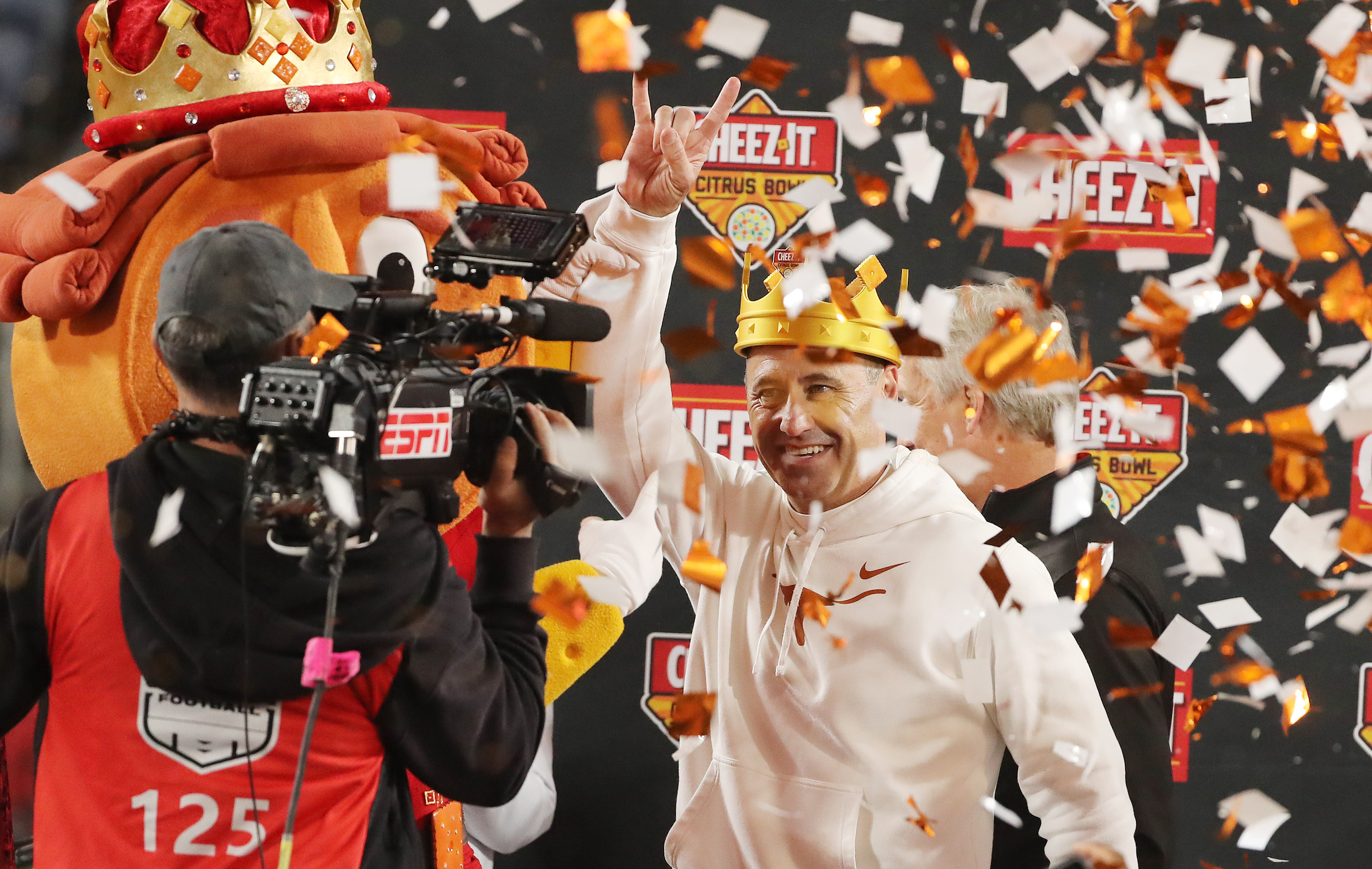 Texas head coach Steve Sarkisian celebrates after winning the Cheez-It...