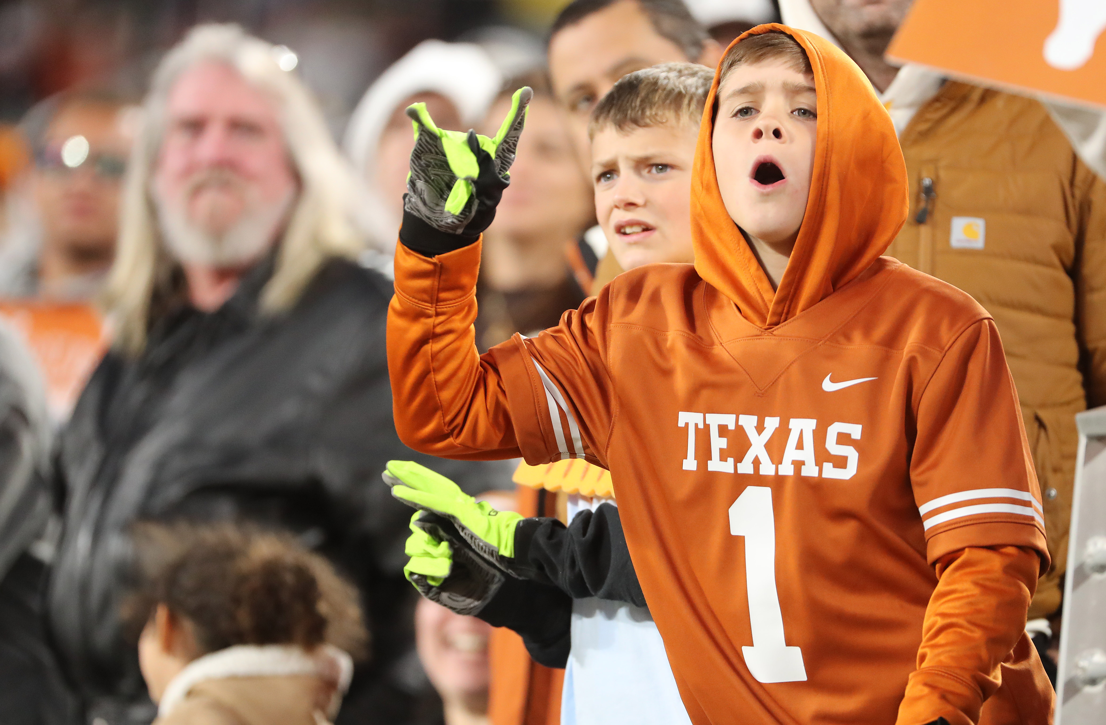 Texas fans cheer during the Cheez-It Citrus Bowl game of...