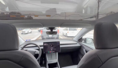 A Tesla Robotaxi passenger shows there is no safety personnel present as the vehicle drives itself in Austin, Texas.