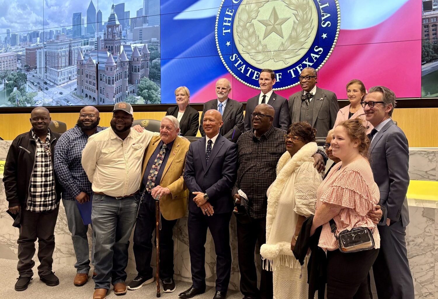Family of Tommy Lee Walker with Dallas County officials.