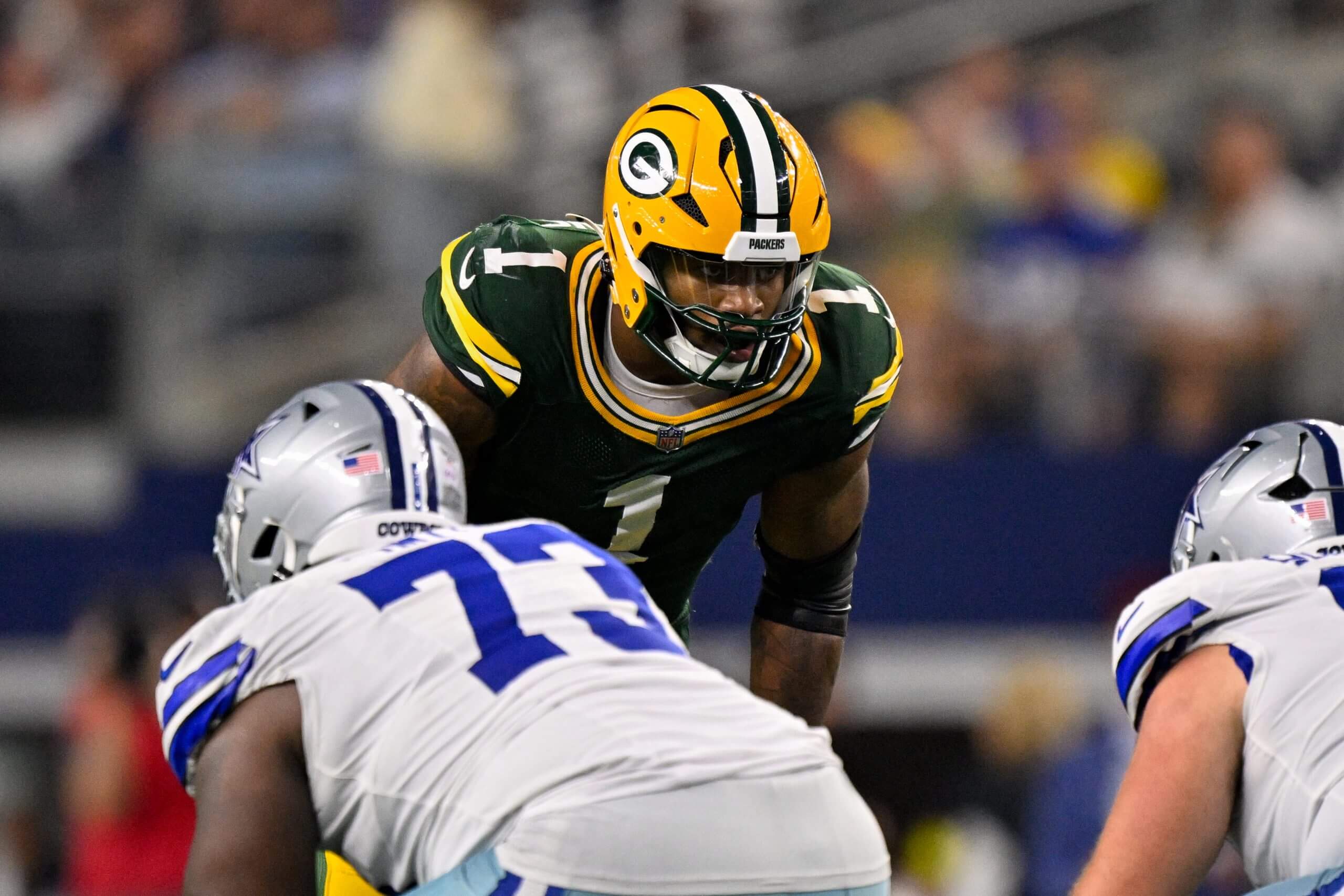 Green Bay Packers pass rusher Micah Parsons prepares to rush the quarterback against the Dallas Cowboys at AT&T Stadium in Arlington, Texas.