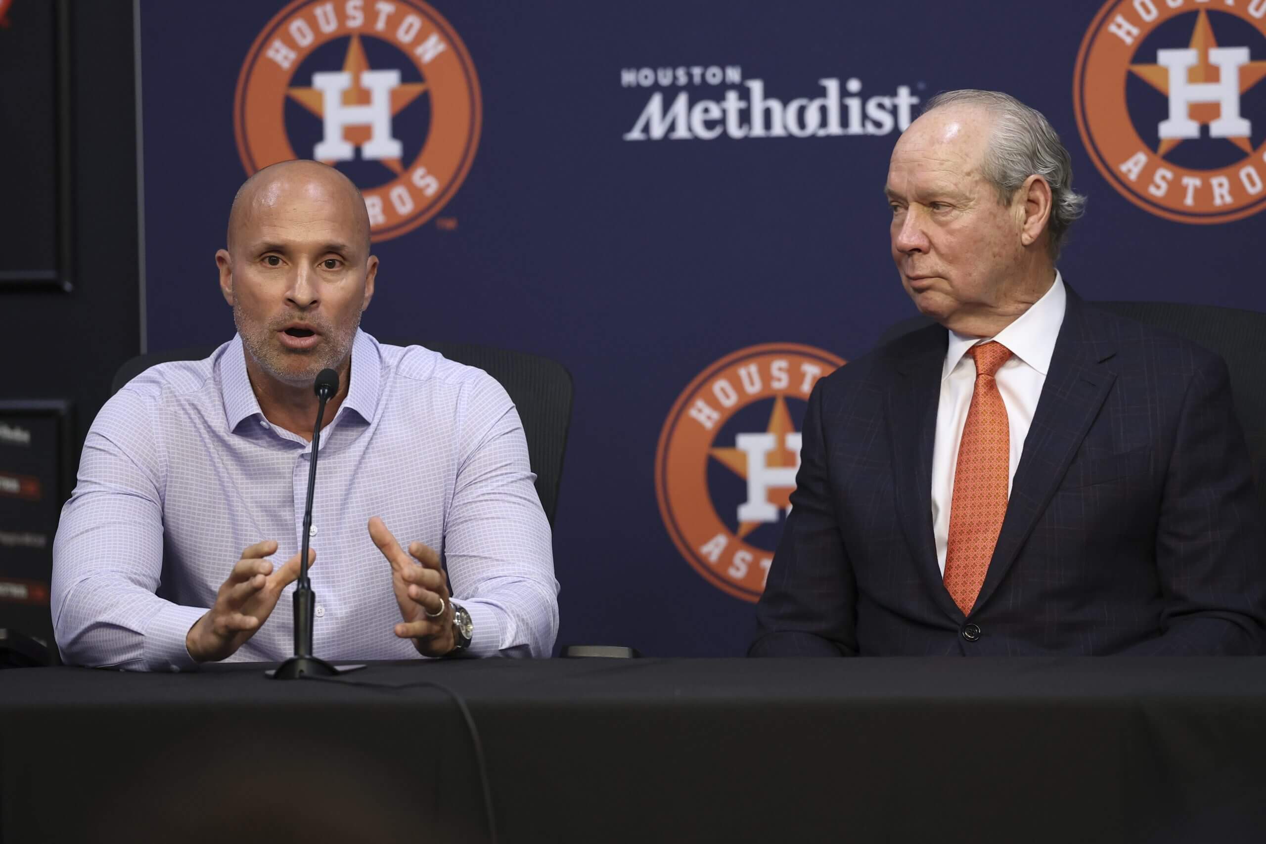 Joe Espada speaks next to Jim Crane at Tatsuya Imai's introductory news conference.
