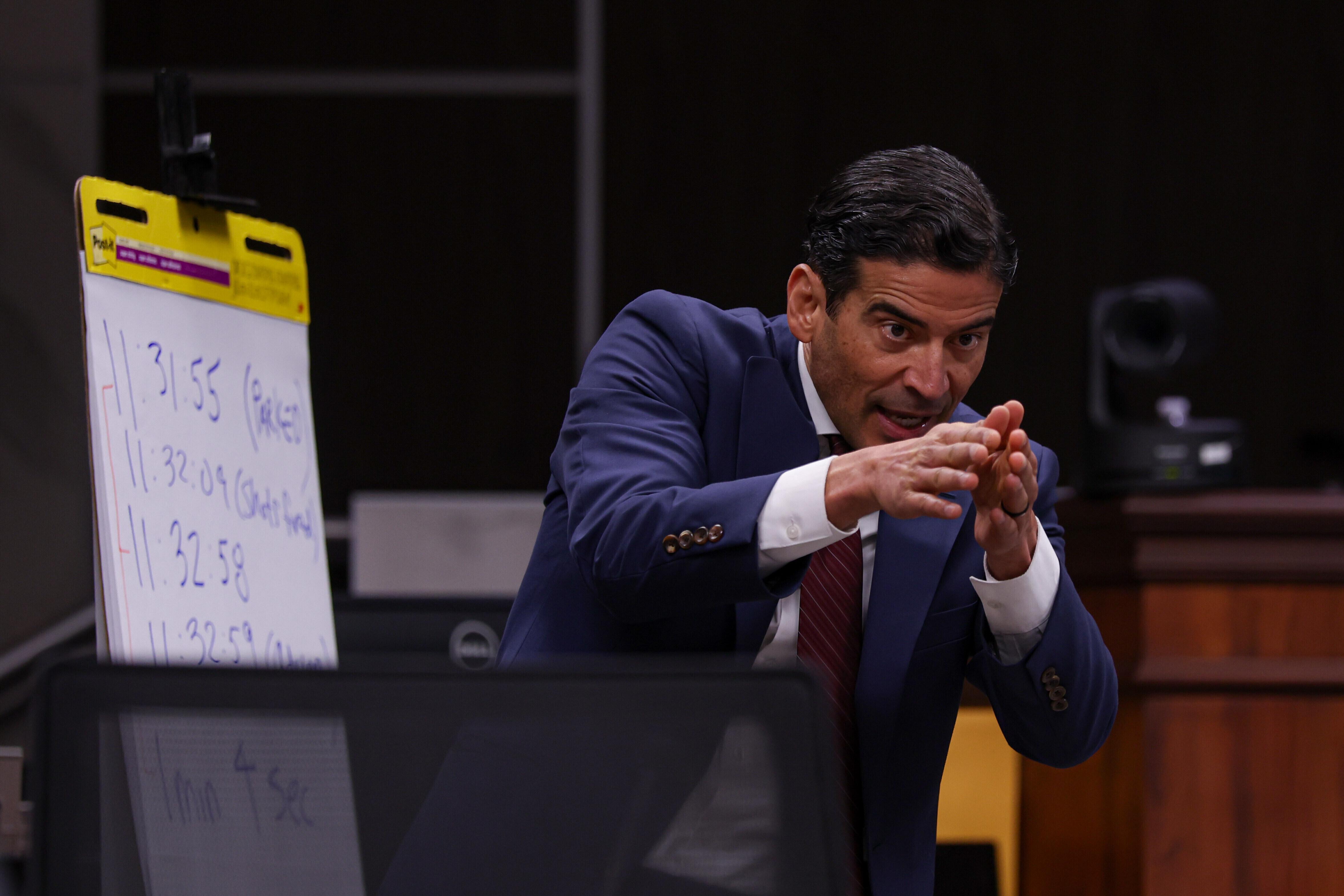 Defense attorney Nico LaHood cross-examines the prosecution’s witness Nick Hill,...