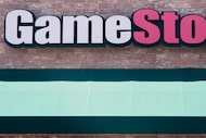 FILE - The sign hangs above the doorway into a GameStop store, June 11, 2024, in Lone Tree,...