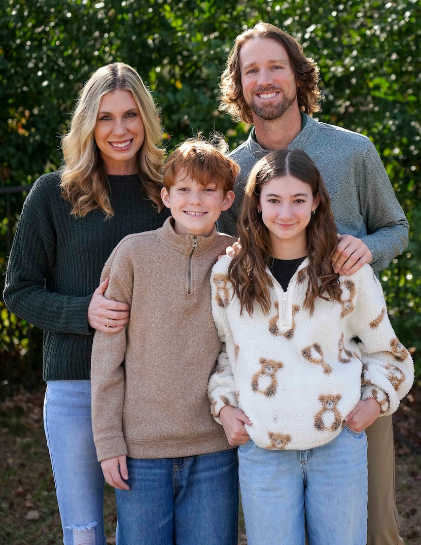 Zack Kulesz pictured at his Arlington home with his wife, Lauren, daughter, Grace, and son,...