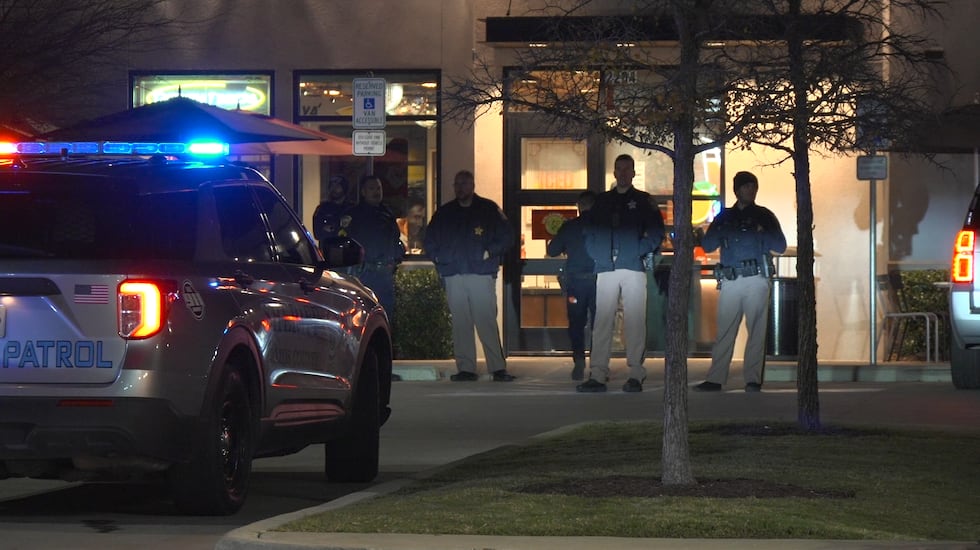 Police were seen outside of the Raising Canes on Briarcrest Drive following a deadly shooting...