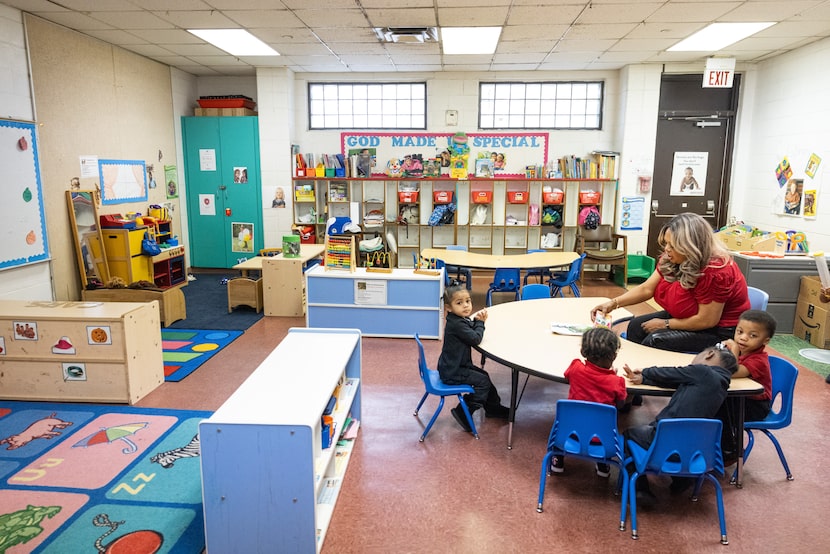 Toddlers teacher Angela Nails lists off books of the Bible with students at Good Street...