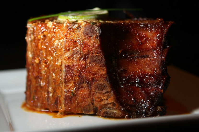 The pork chop is a beloved dish at Perry's Steakhouse and Grille, Dallas' most romantic...