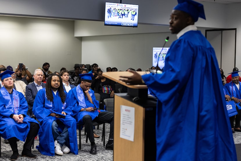Dallas College construction and HVAC student Jamie Perry speaks to his class during the...