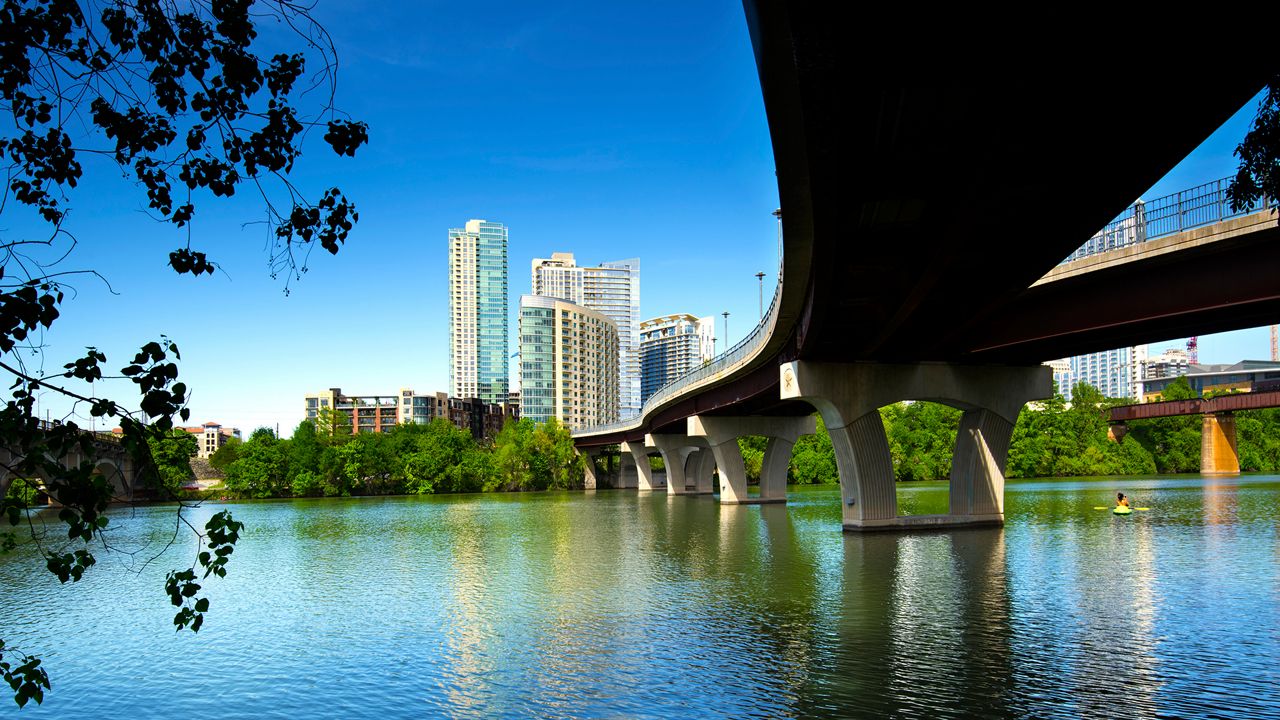 The James D. Pfluger Pedestrian and Bicycle Bridge crosses Lady Bird Lake in downtown Austin, Texas.  The bridge connects the north and south side of the Lady Bird Hike and Bike Trail. (Getty Images)