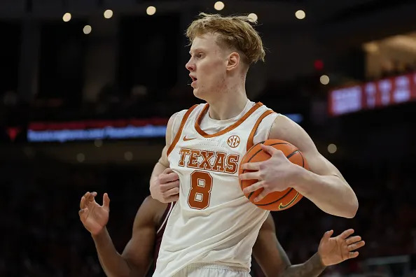 AUSTIN, TX – JANUARY 17: Center Matas Vokietaitis #8 of the Texas Longhorns holds a rebound tight to his body during the SEC college basketball game between Texas Longhorns and Texas A&M Aggies on January 17, 2026, at Moody Center in Austin, TX. (Photo by David Buono/Icon Sportswire via Getty Images)