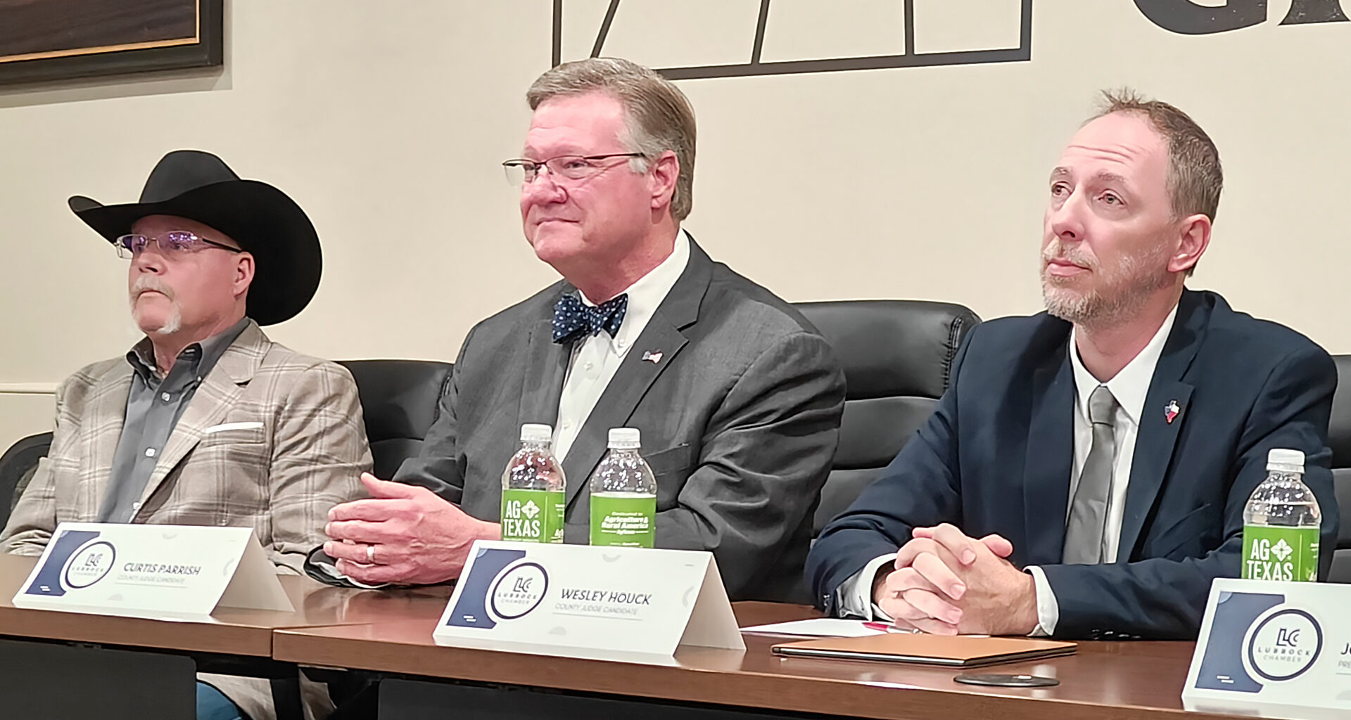 Candidates for county offices address audience questions about taxes and pay raises at forum