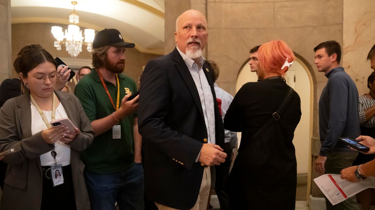Rep. Chip Roy, R-Texas, talks to reporters as he walks into the offices of the Speaker of the House on Capitol Hill, Wednesday, Oct. 4, 2023 in Washington. (AP Photo/Mark Schiefelbein)