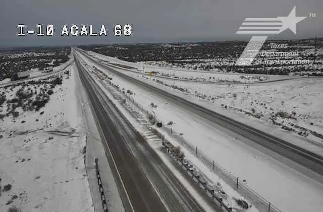 Snows covers the desert along Interstate 10 east of El Paso in Hudspeth County on Sunday morning Jan. 25, 2026, as a winter storm swept through most of Texas.