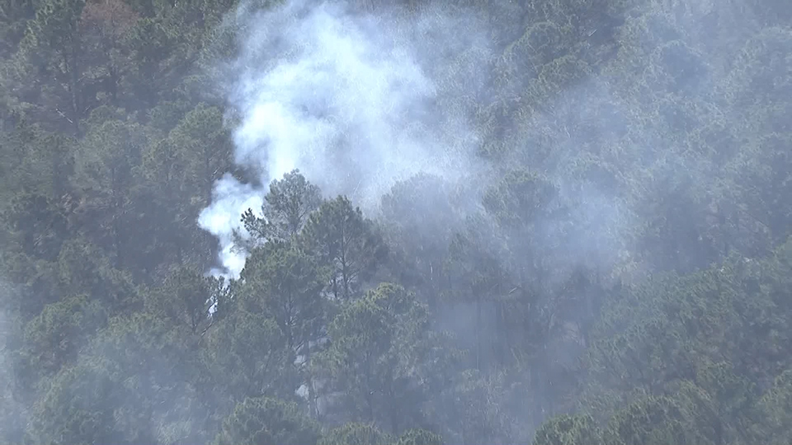 HFD continues monitoring fire burning near Addicks Reservoir