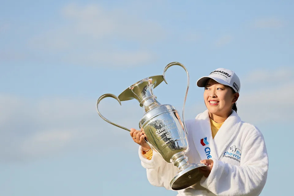Mao Saigo of Japan poses with the trophy after winning The Chevron Championship 2025 in a playoff at The Club at Carlton Woods on April 27, 2025 in The Woodlands, Texas.
